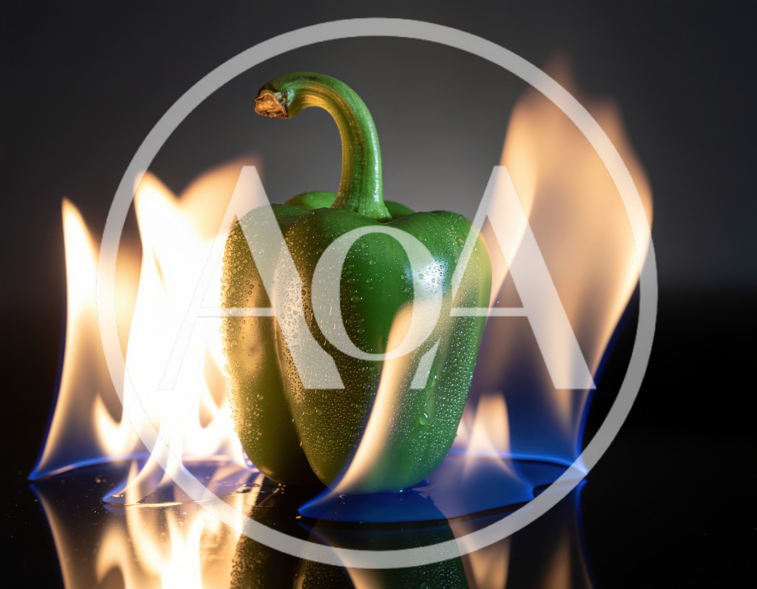 Green Bell Pepper Surrounded By Dancing Flames