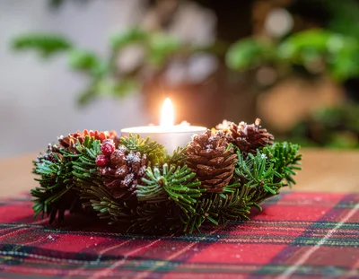 Christmas Candle Wreath on Plaid Tablecloth