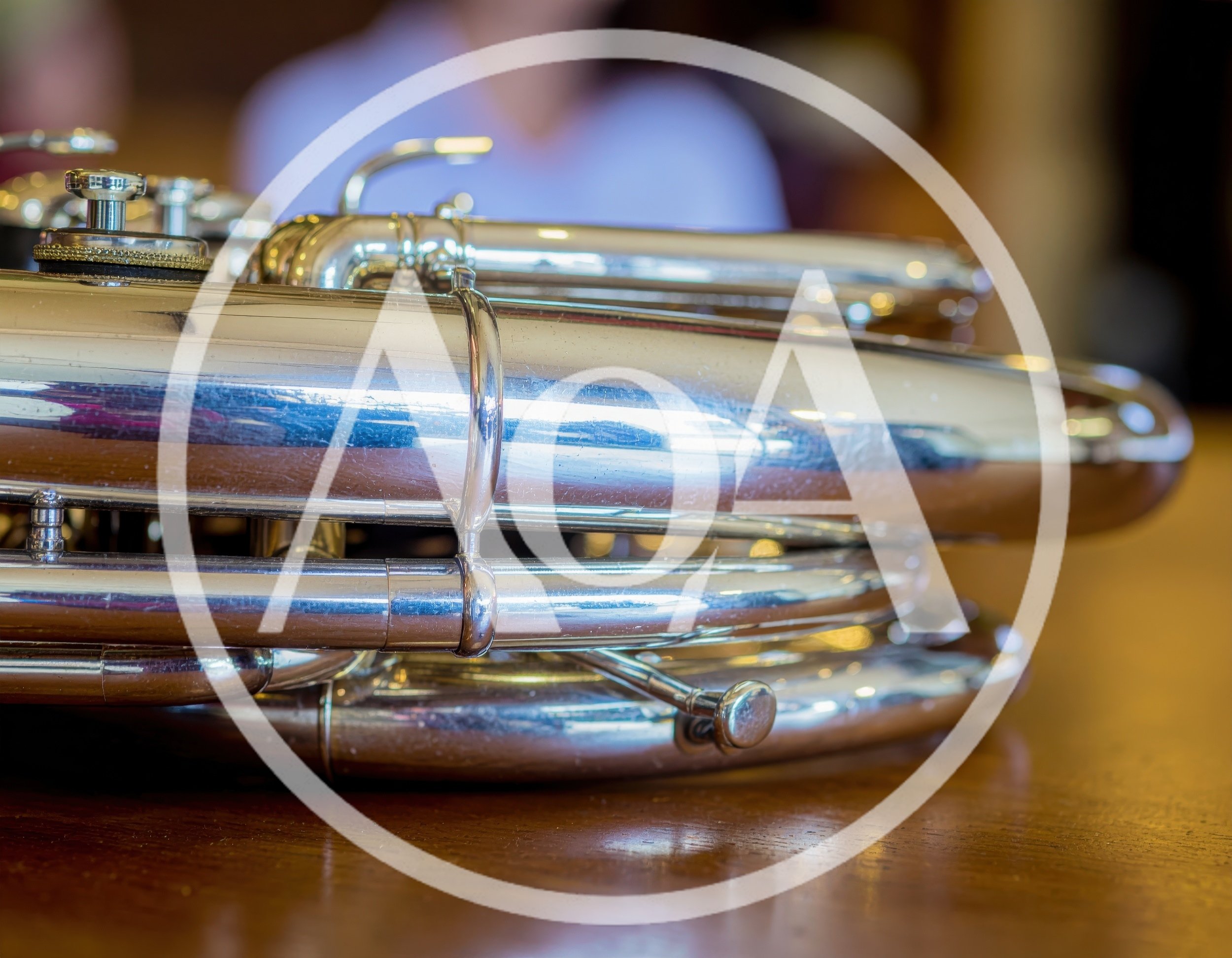 Close Up Of A Silver Tuba On A Table