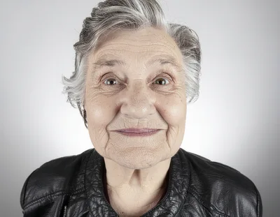 Portrait Of An Elderly Woman With Gray Hair