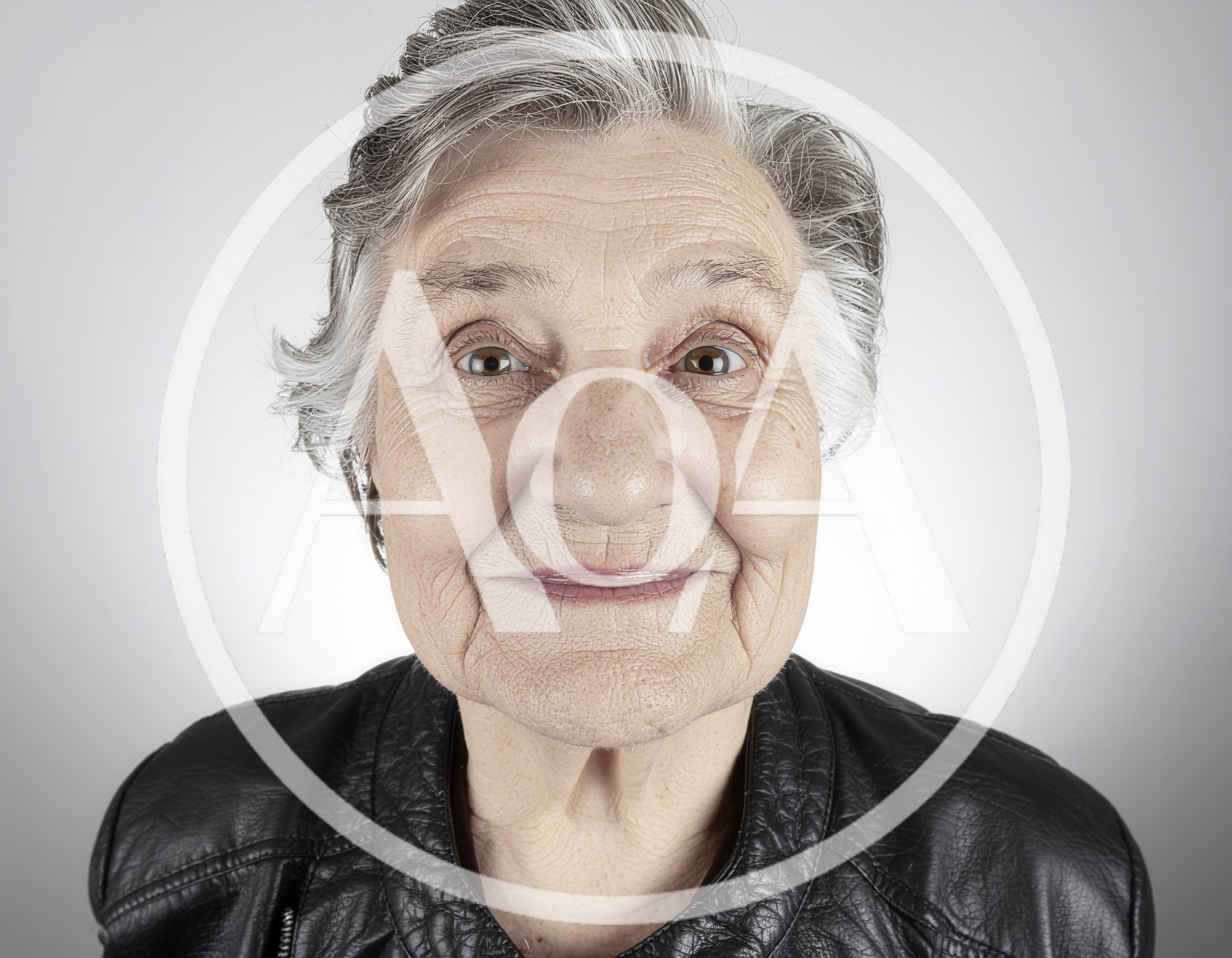 Portrait Of An Elderly Woman With Gray Hair