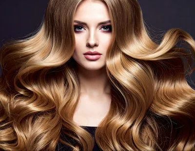 Portrait Of A Beautiful Woman With Long Wavy Blonde Hair