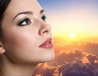 Portrait Of A Beautiful Woman Looking At The Sunset