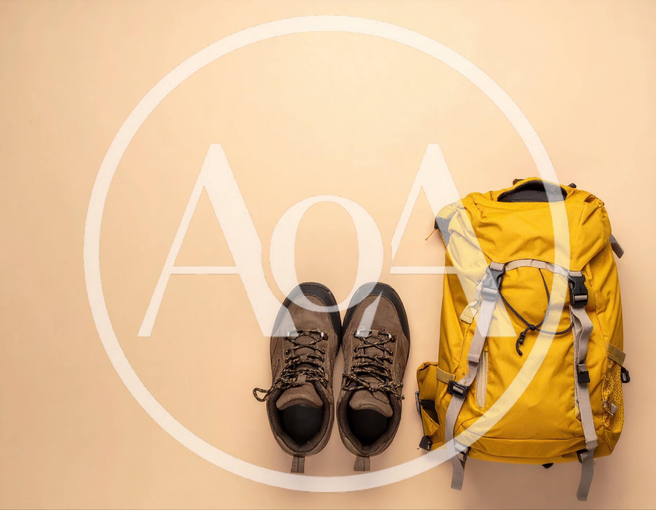Hiking Backpack and Boots on Beige Background