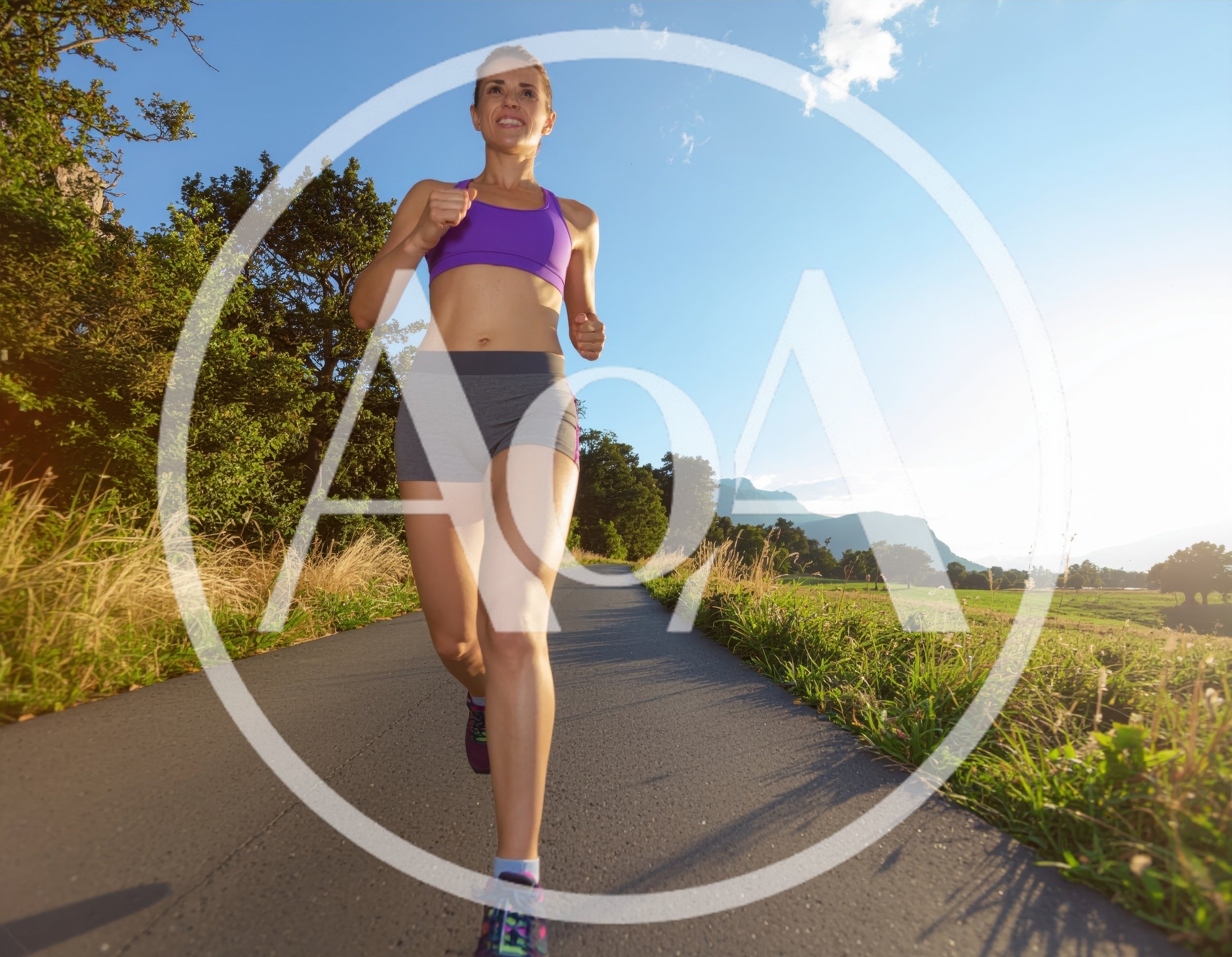 Woman Jogging on a Country Road at Sunset