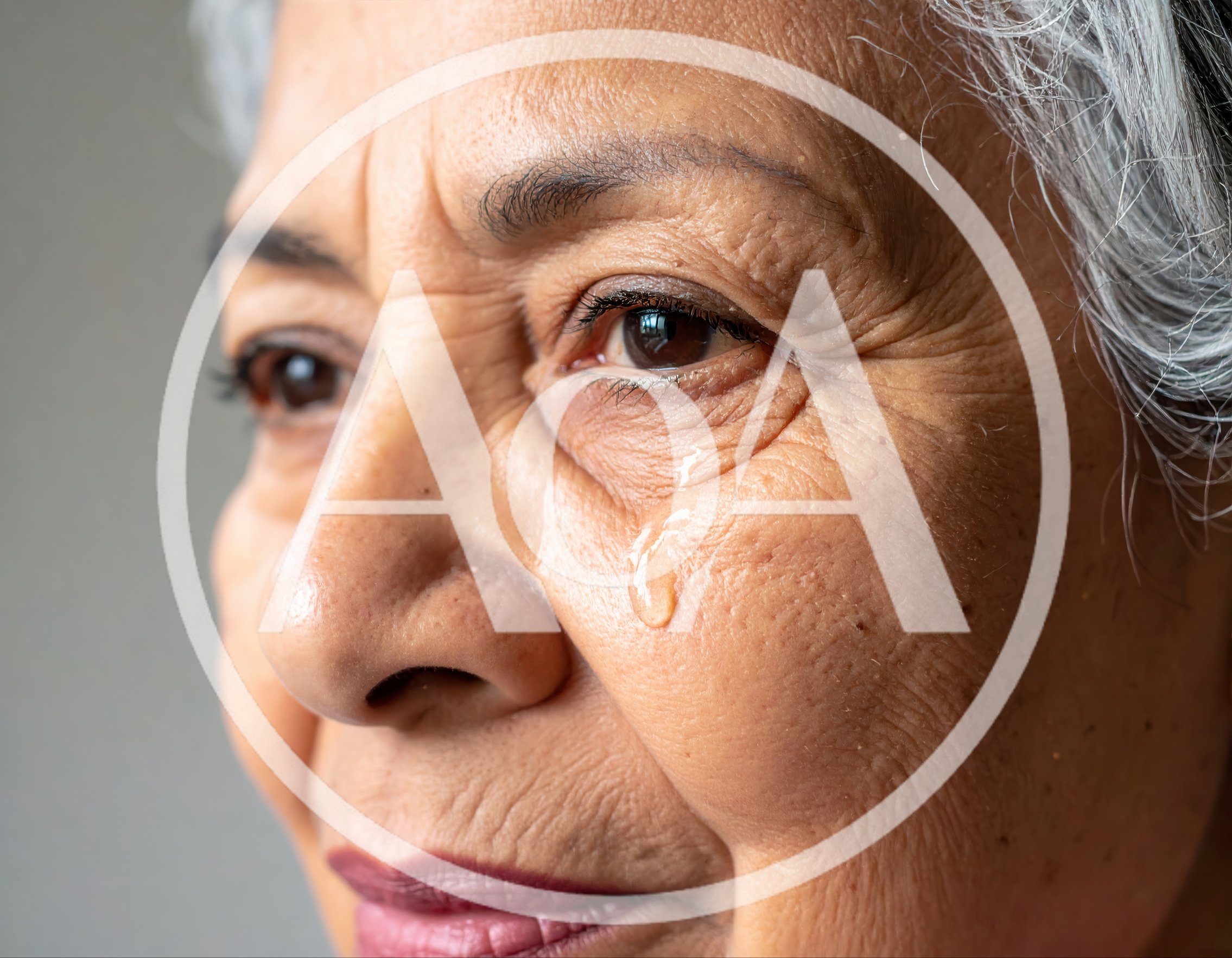 Close Up Portrait Of An Elderly Woman Crying