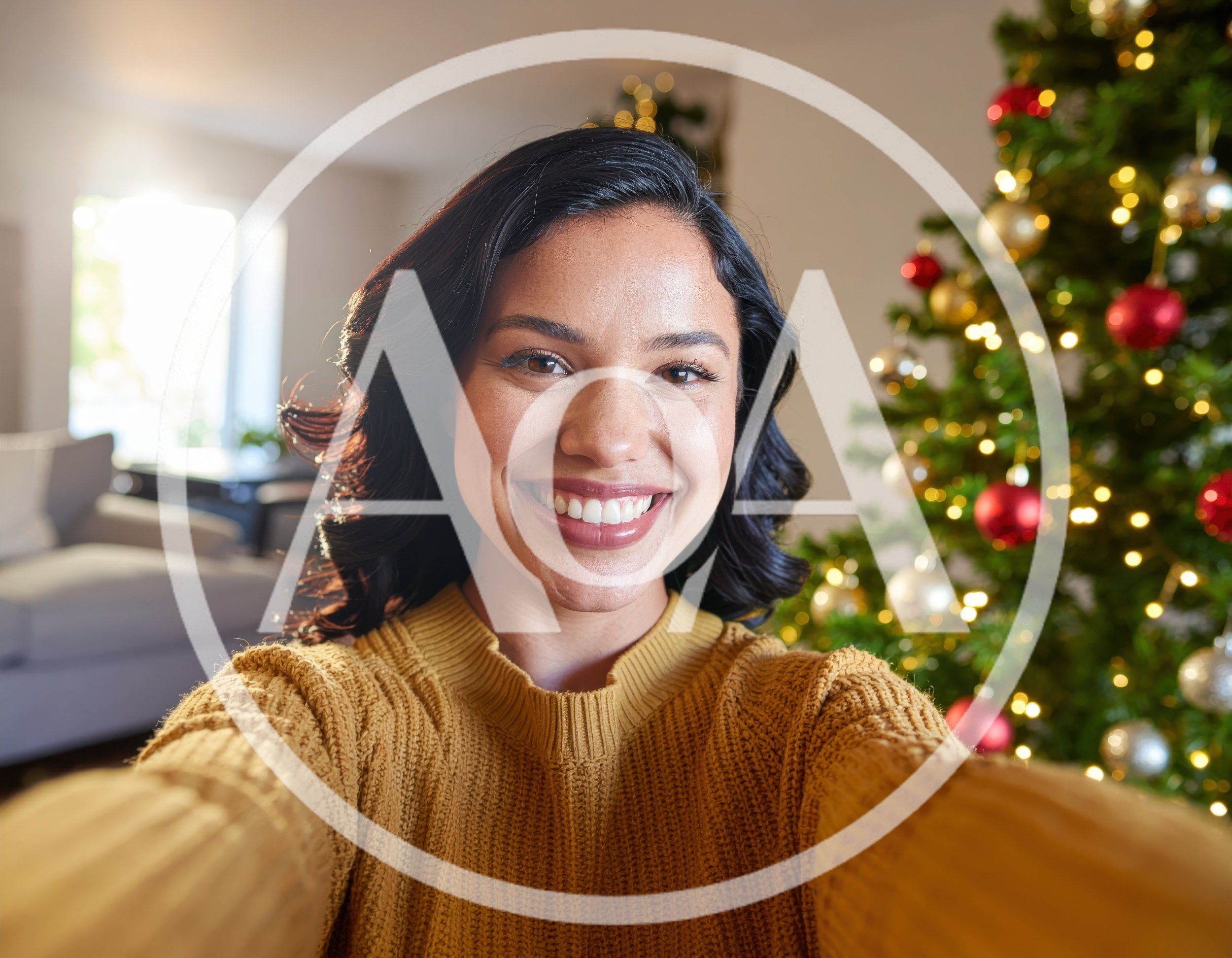 Young Woman Taking A Selfie In Front Of Christmas Tree