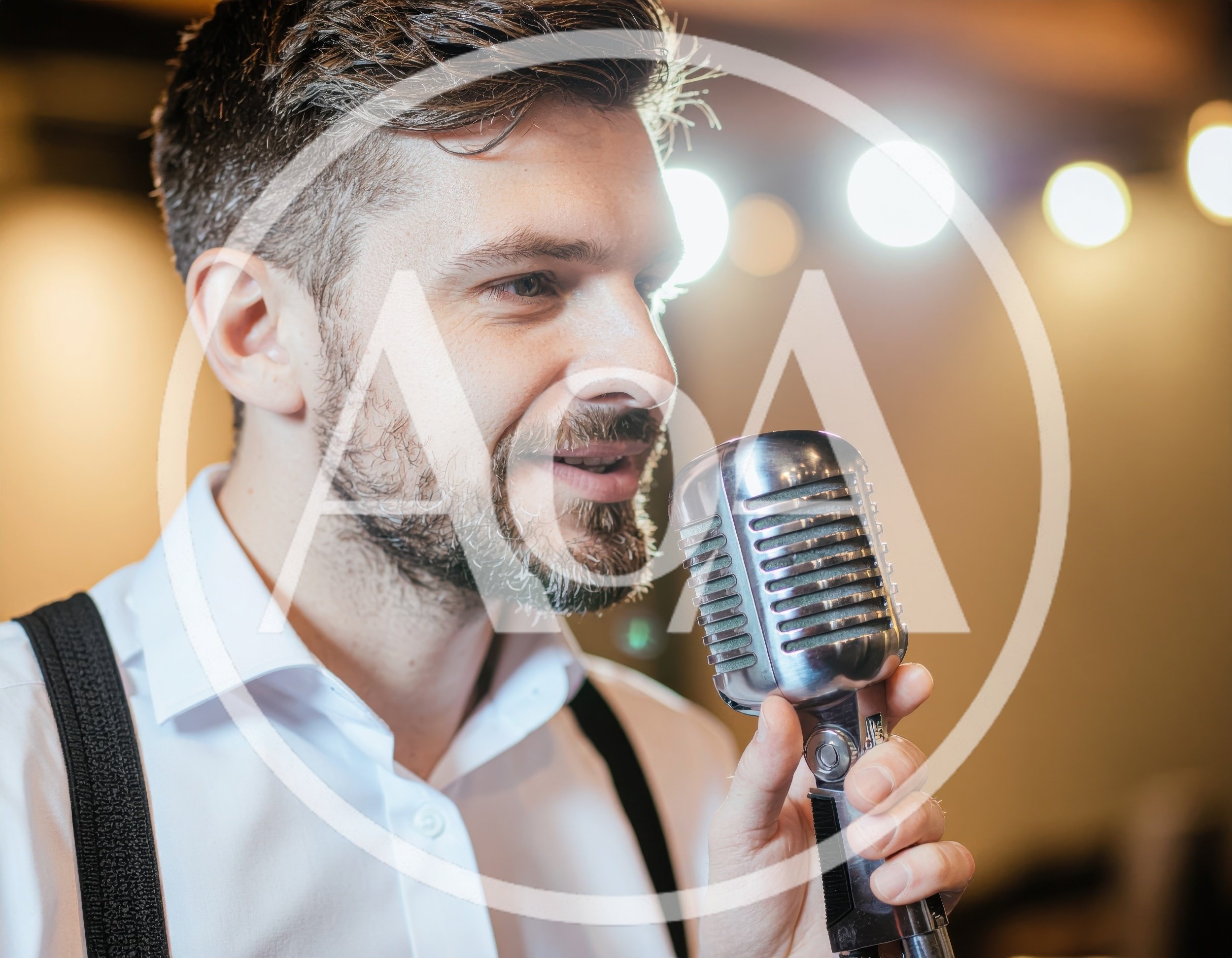 Man Singing Into A Vintage Microphone