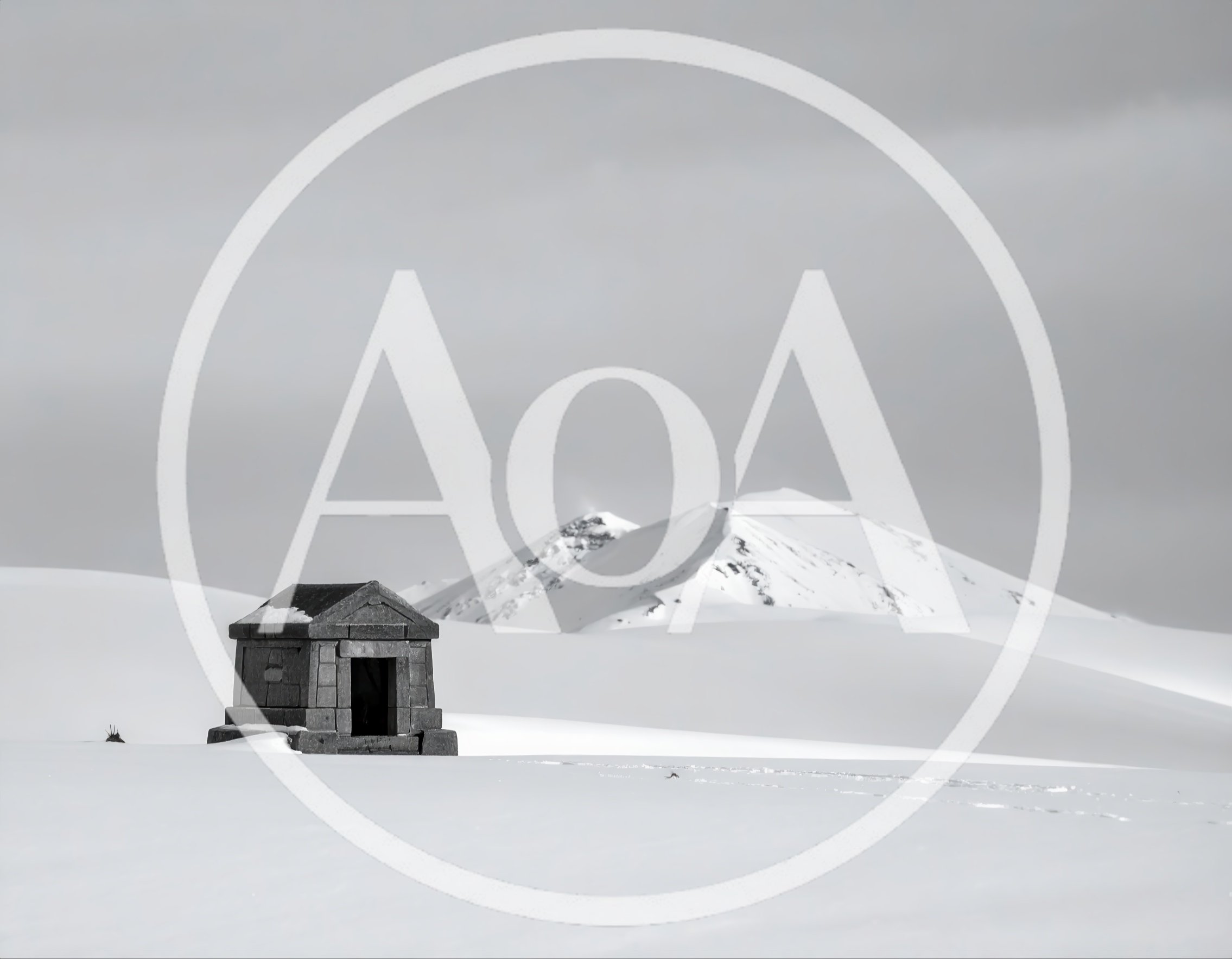 Small Stone Structure In A Snowy Mountain Landscape