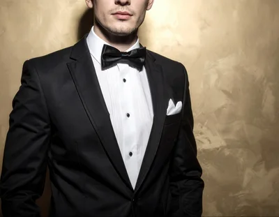 Elegant Man In Black Tuxedo And Bow Tie