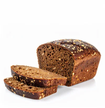 Loaf Of Dark Rye Bread With Two Slices