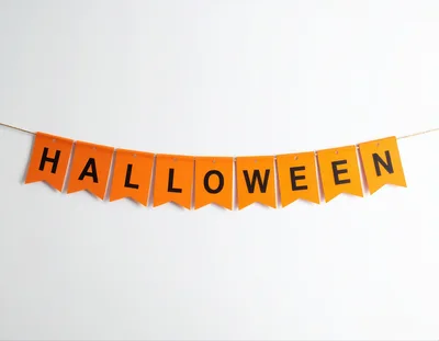 Halloween Banner Hanging On A White Background