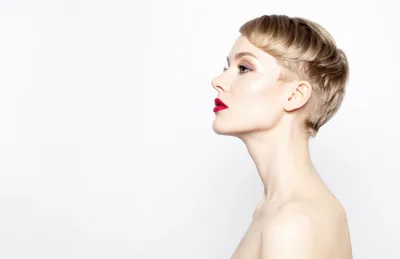 Profile Portrait Of A Woman With Short Blonde Hair
