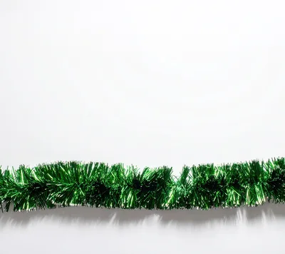 Green Christmas Tinsel Garland on White Background