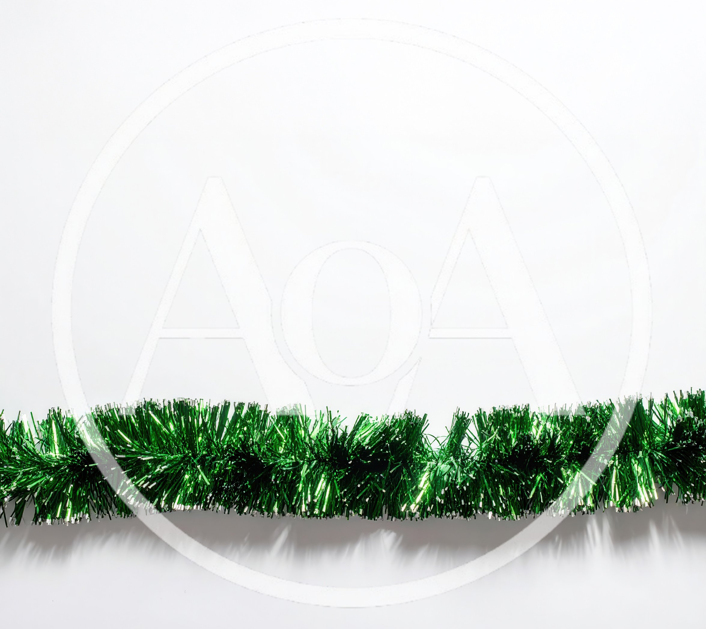 Green Christmas Tinsel Garland on White Background