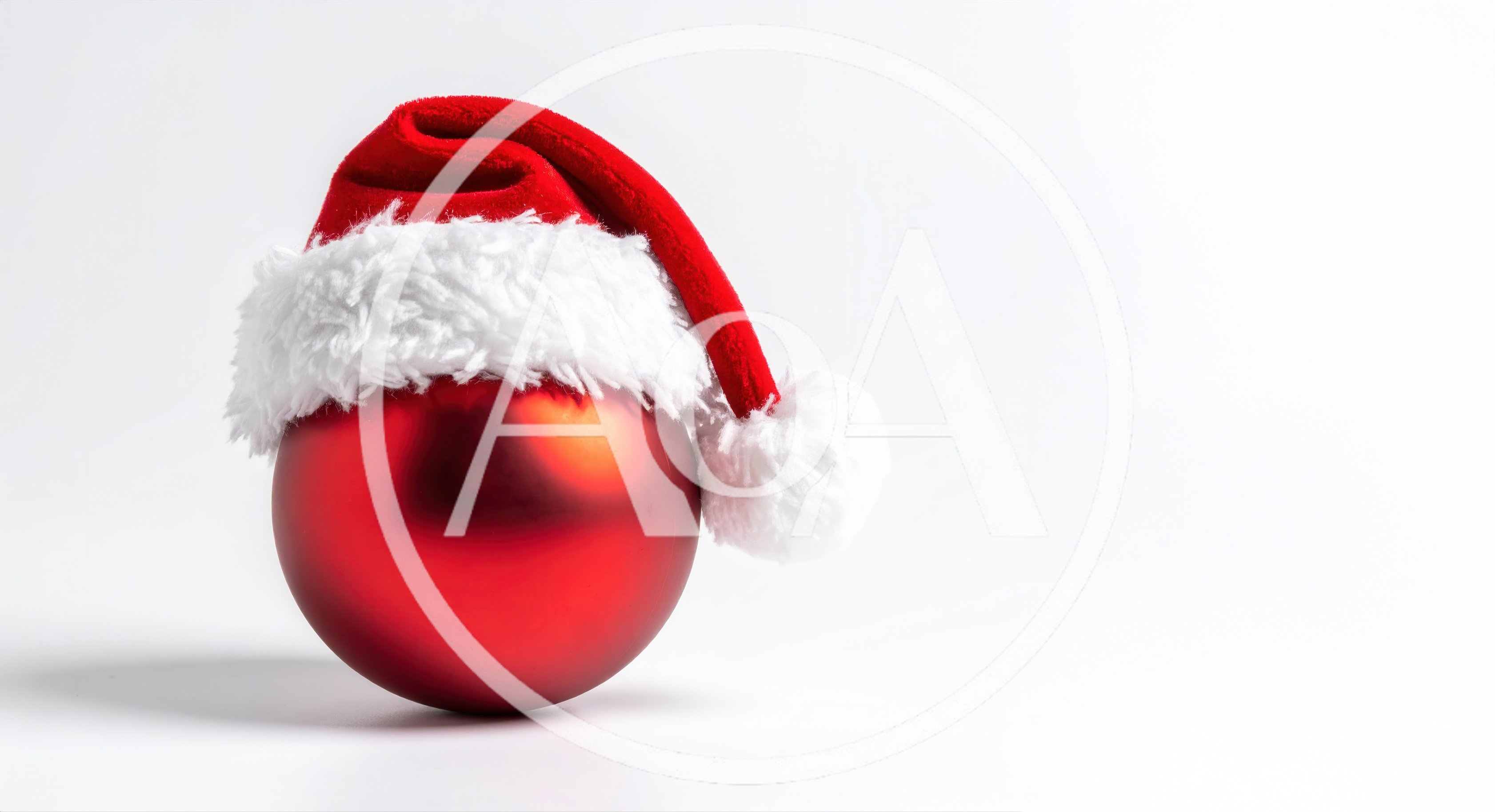Red Christmas Ornament Wearing A Santa Hat