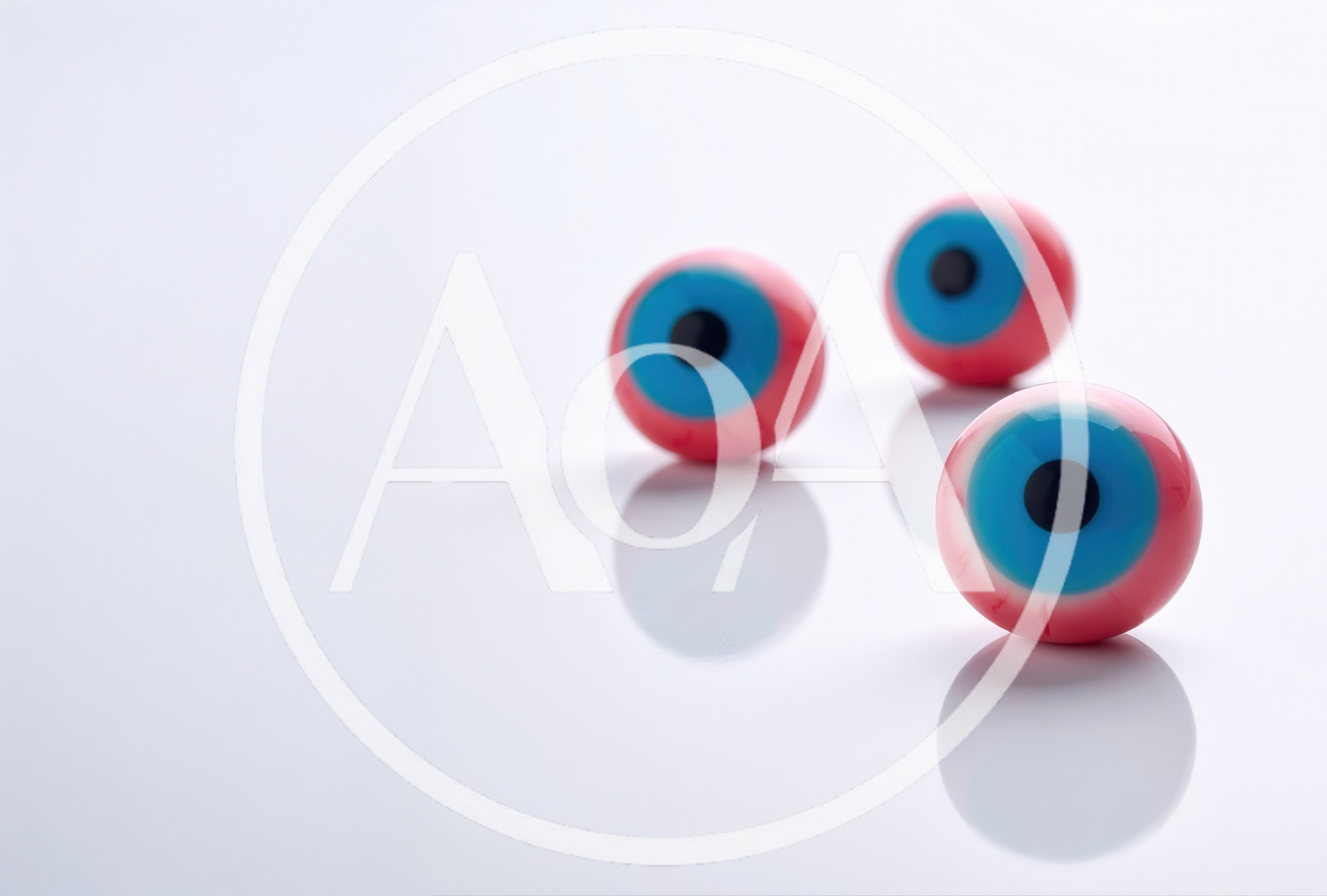 Three Realistic Eyeball Candies On White Background