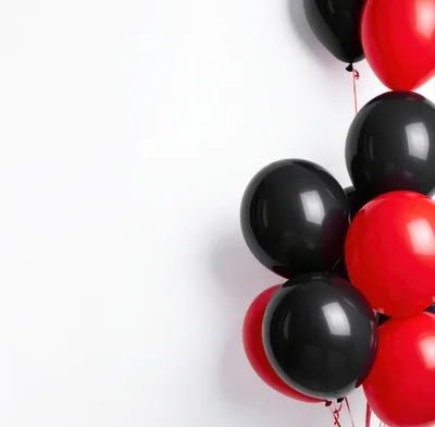 Bunch of Red and Black Balloons on White Background