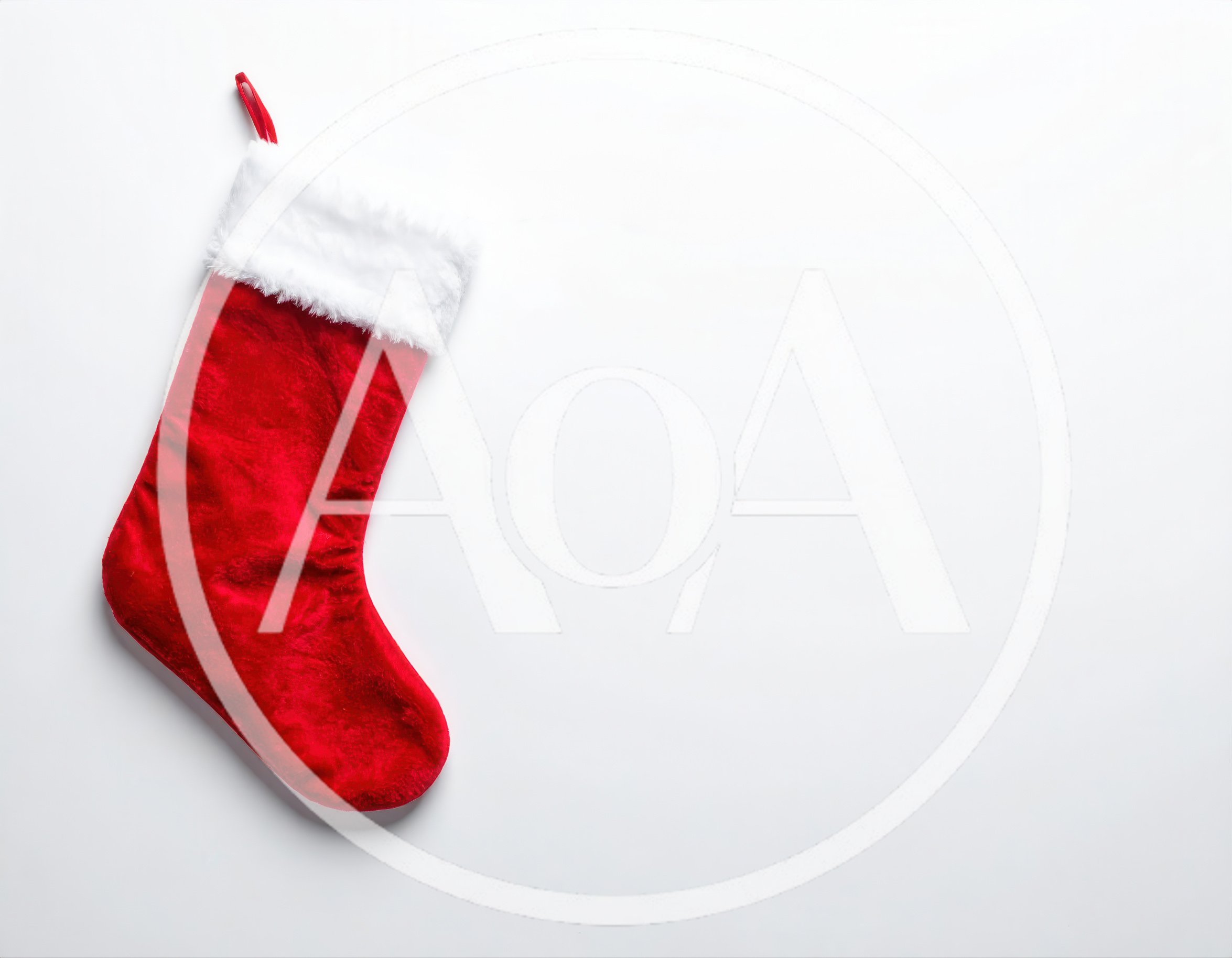 Red Christmas Stocking Hanging On White Background