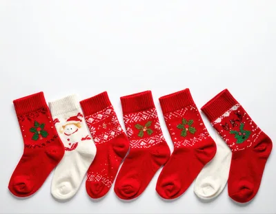 Collection of Festive Christmas Socks on White Background