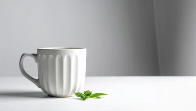 White Ribbed Ceramic Mug With Fresh Mint Leaves
