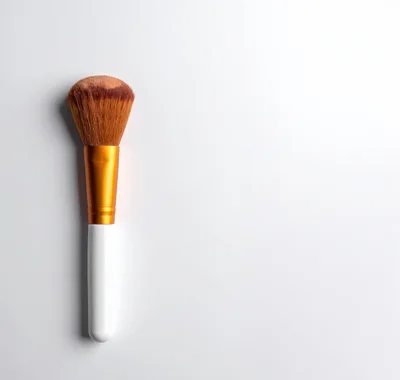 Makeup Brush With White Handle On White Background