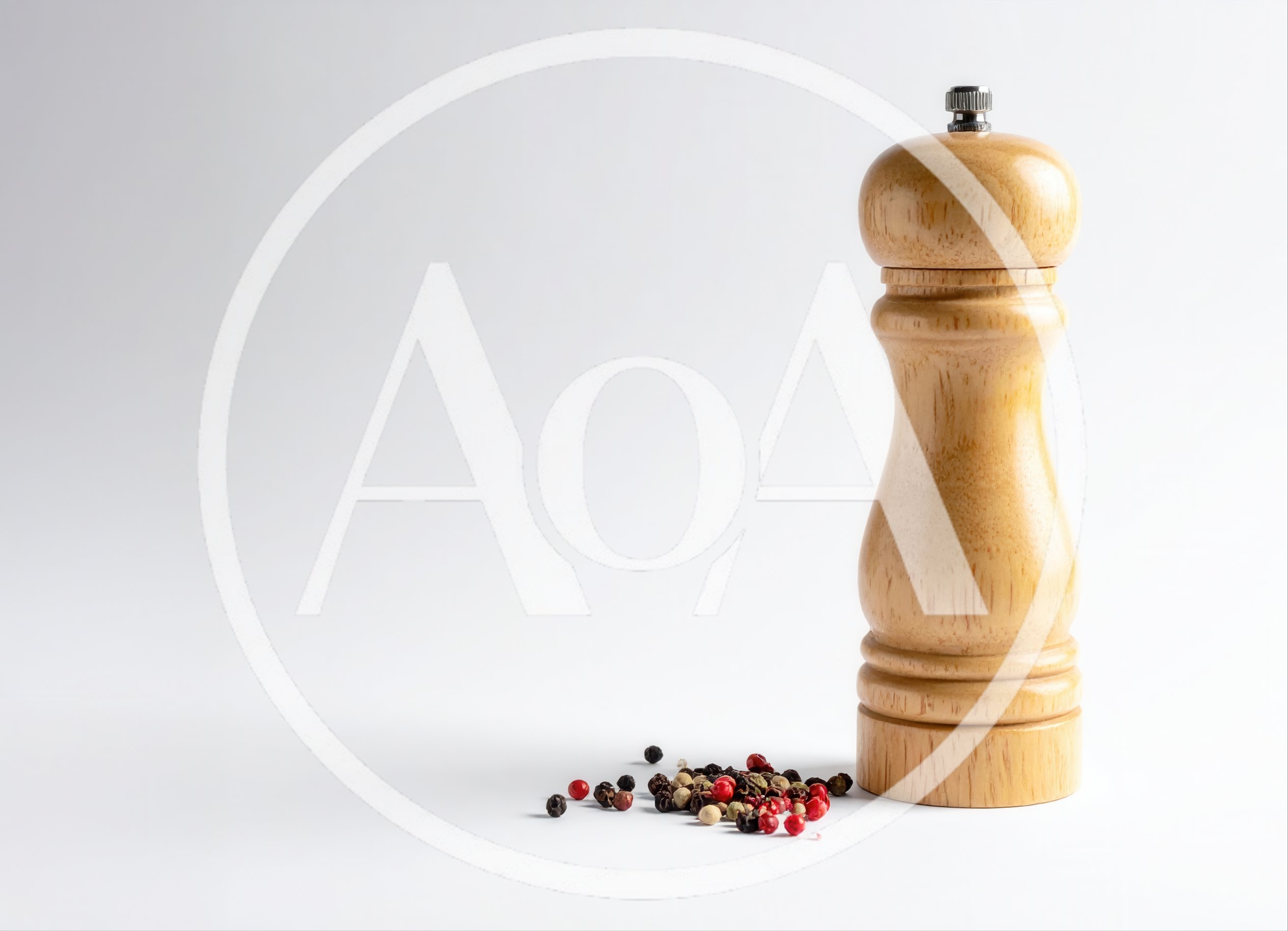 Wooden Pepper Mill With Peppercorns On White Background