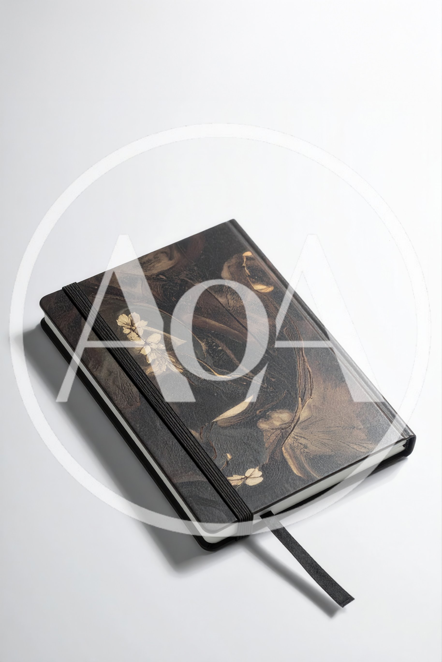 Closed Notebook With Floral Pattern On White Background