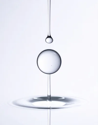 Macro Water Drop Collision With Ripples