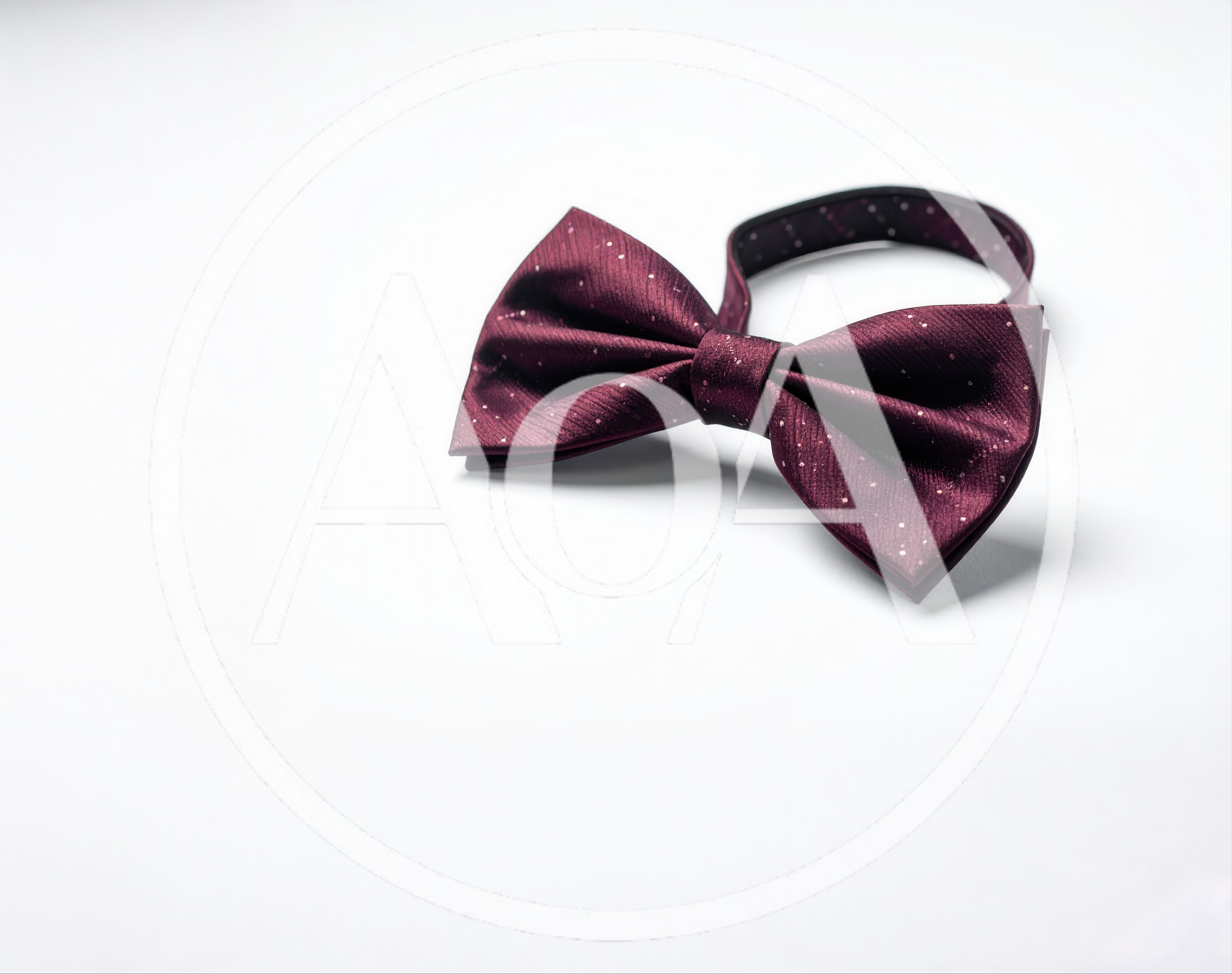 Burgundy Polka Dot Bow Tie on White Background