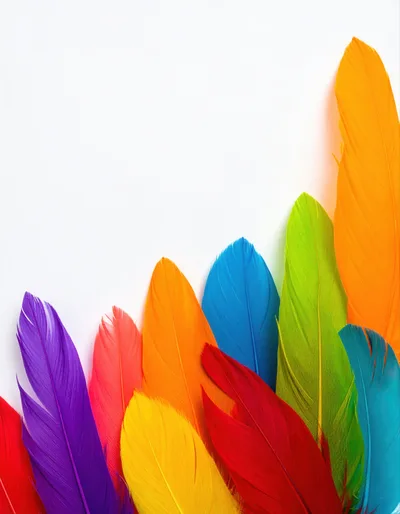 Vibrant Multi-Colored Feathers Arranged On White Background