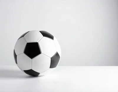 Classic Black and White Soccer Ball on White Background