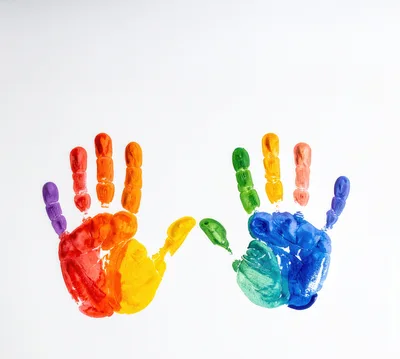 Colorful Rainbow Handprints On White Background