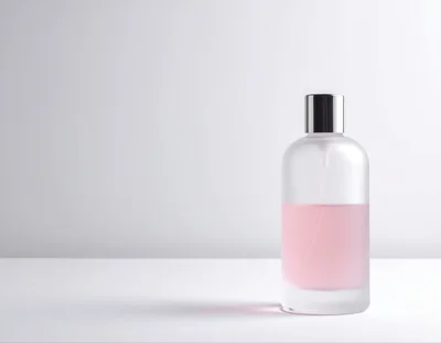 Frosted Glass Perfume Bottle With Pink Liquid