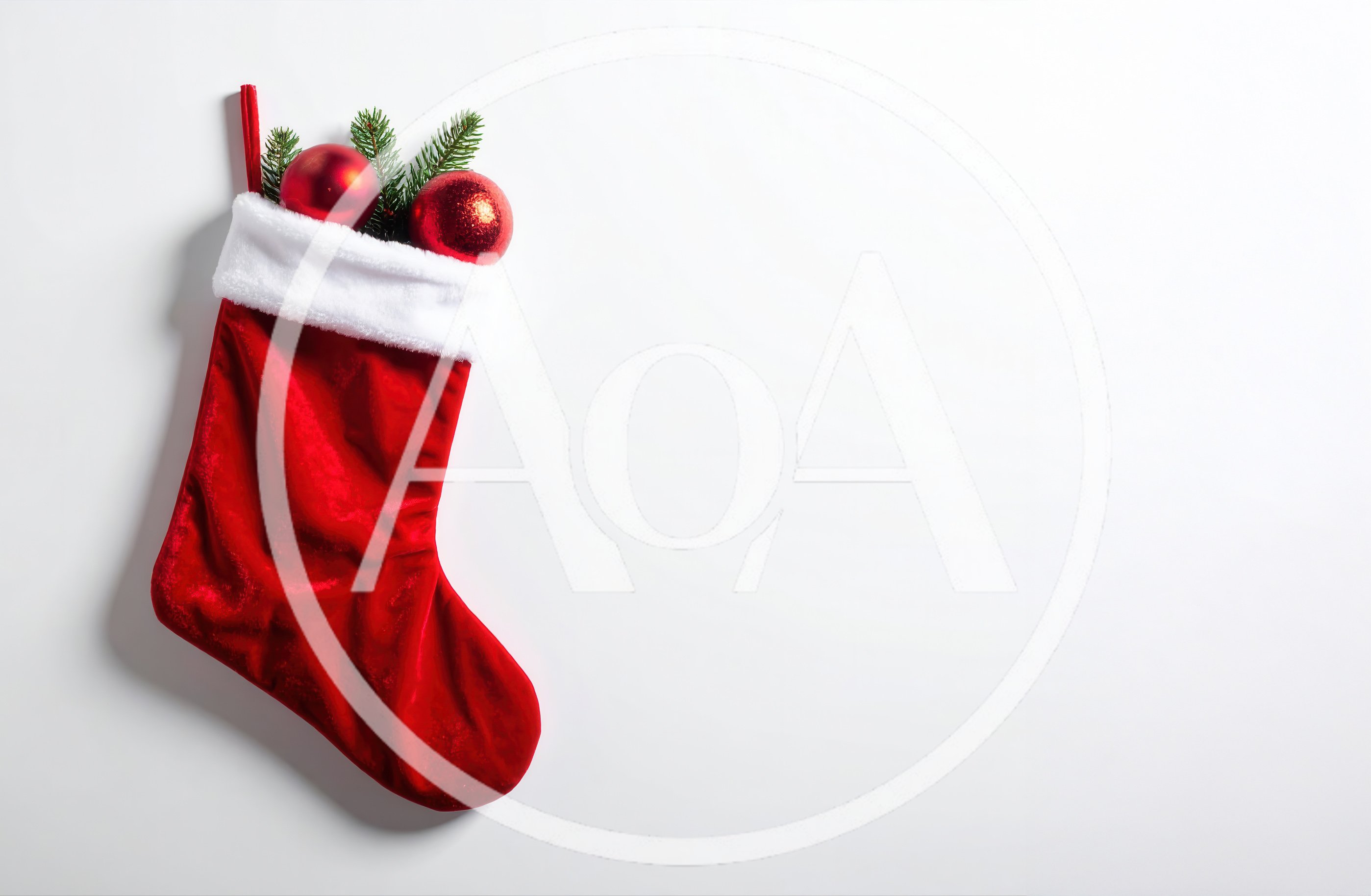 Red Christmas Stocking With Ornaments On White Background