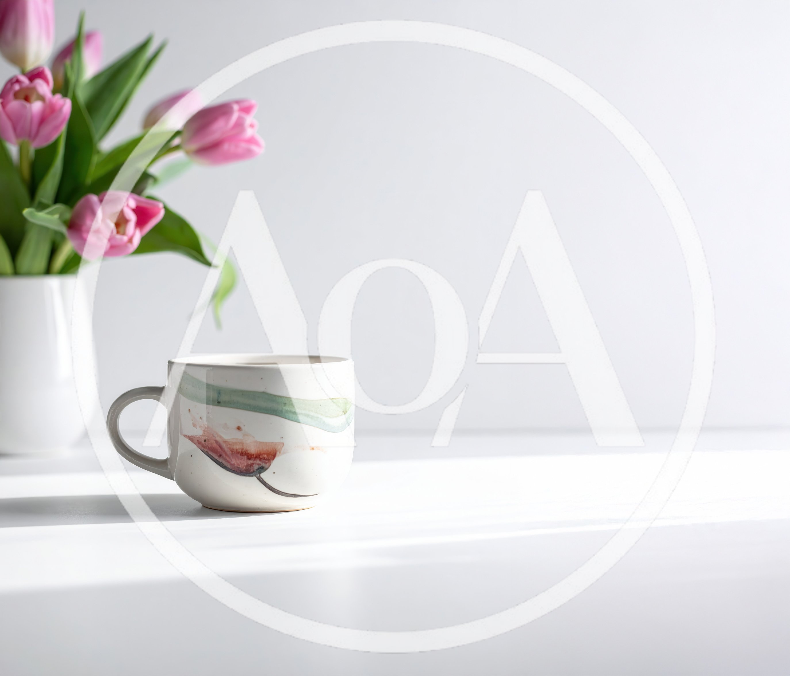 Ceramic Coffee Mug Beside Pink Tulips