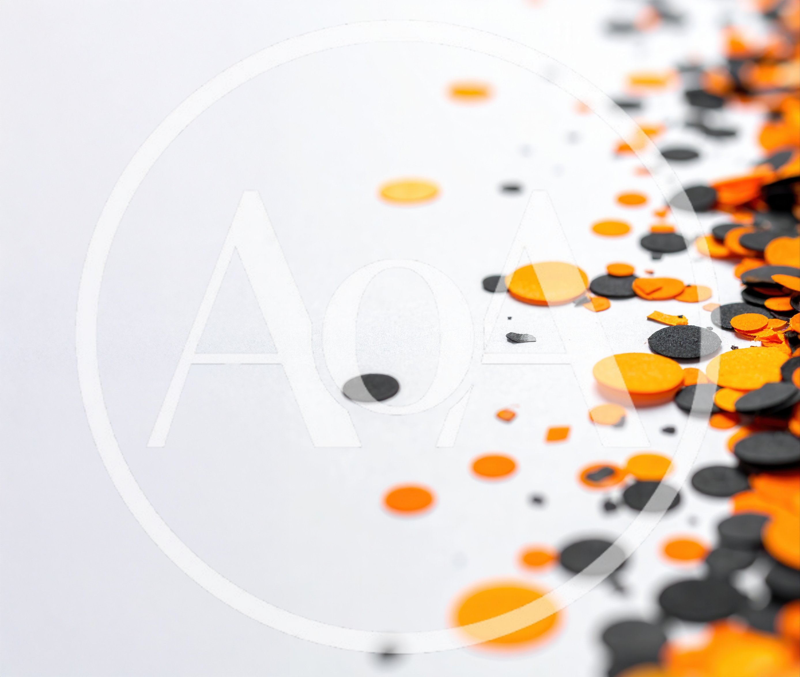 Orange And Black Halloween Confetti On White Background
