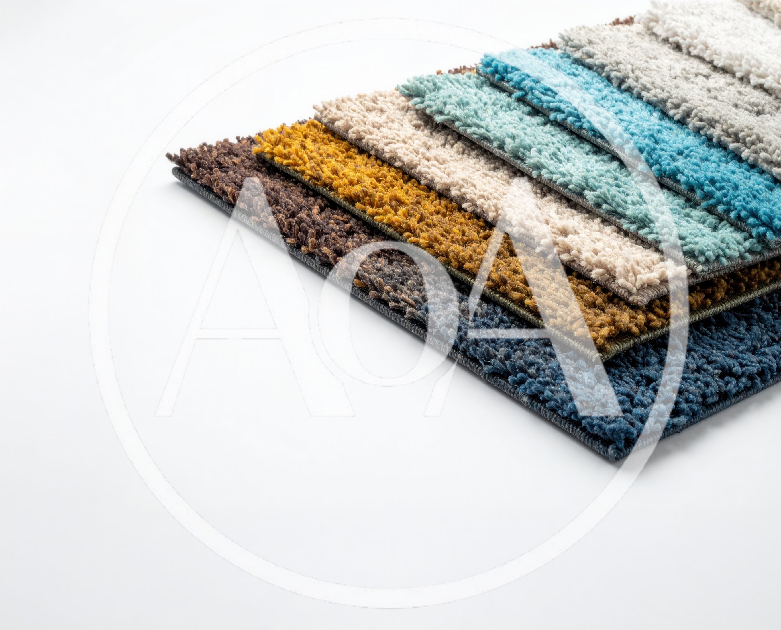 Stacked Carpet Tile Samples In Various Colors
