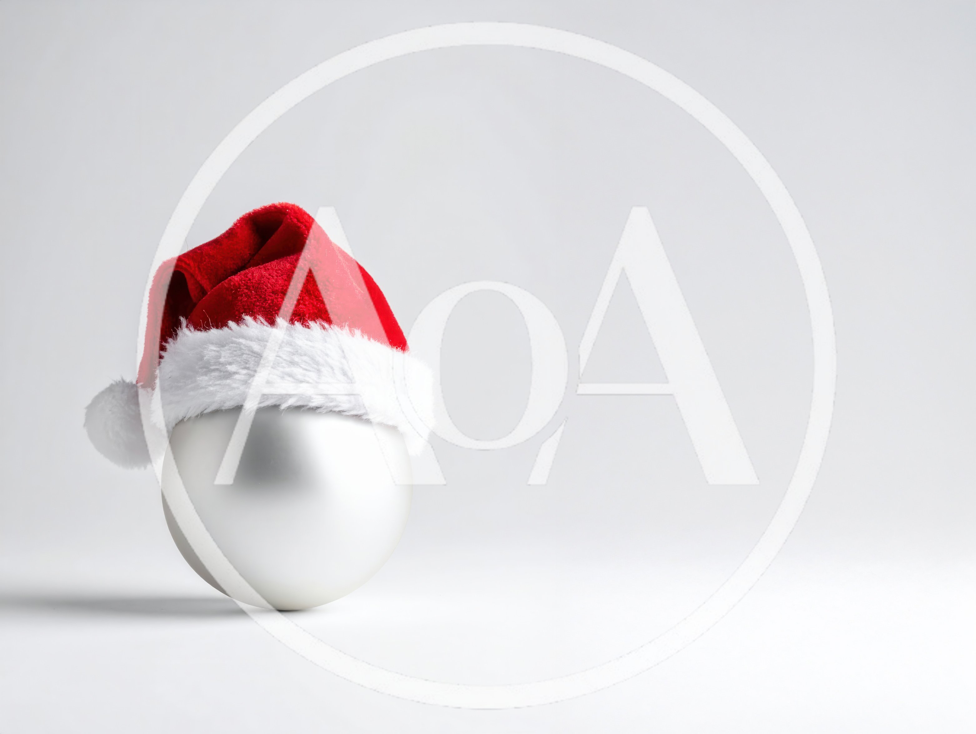 Silver Christmas Ornament Wearing A Santa Hat