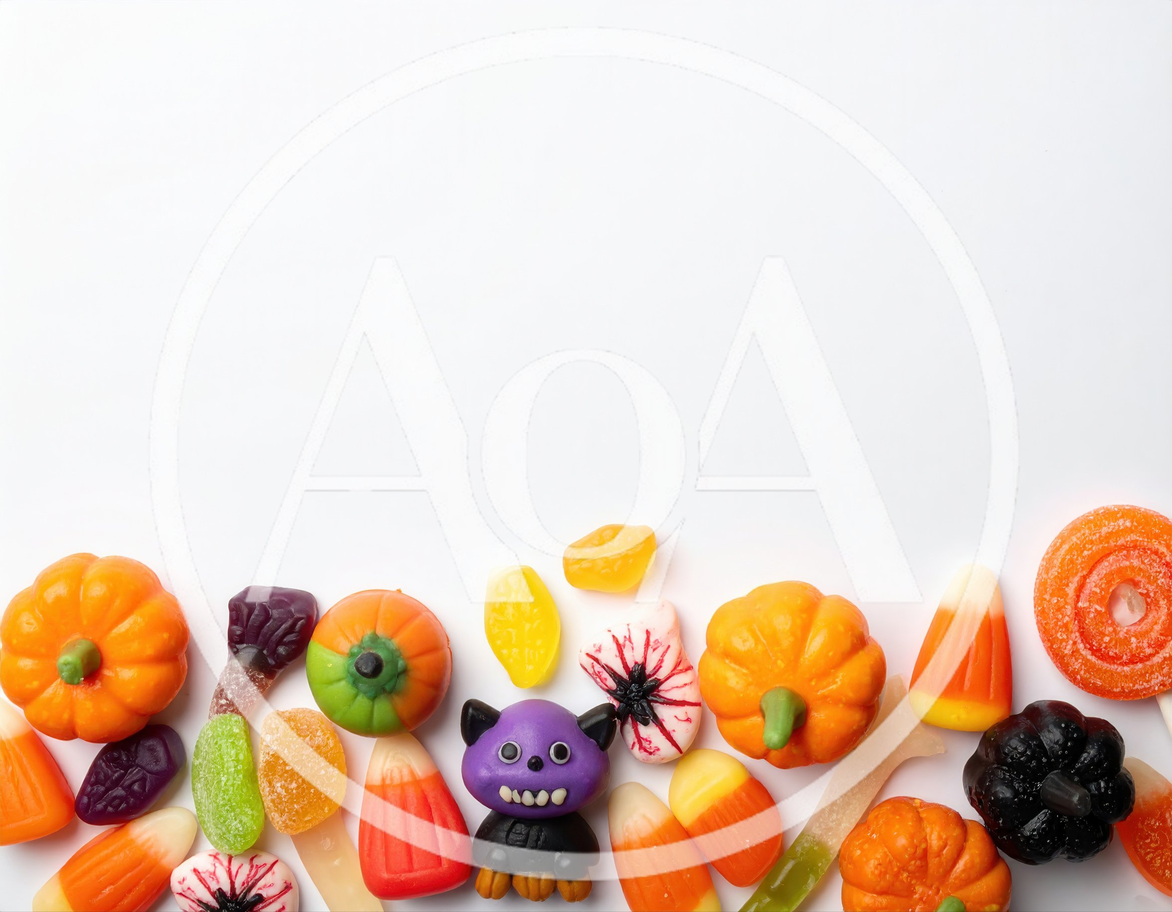 Assorted Halloween Candy Treats on White Background