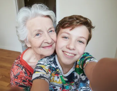 Grandmother and Grandson Taking a Selfie Together