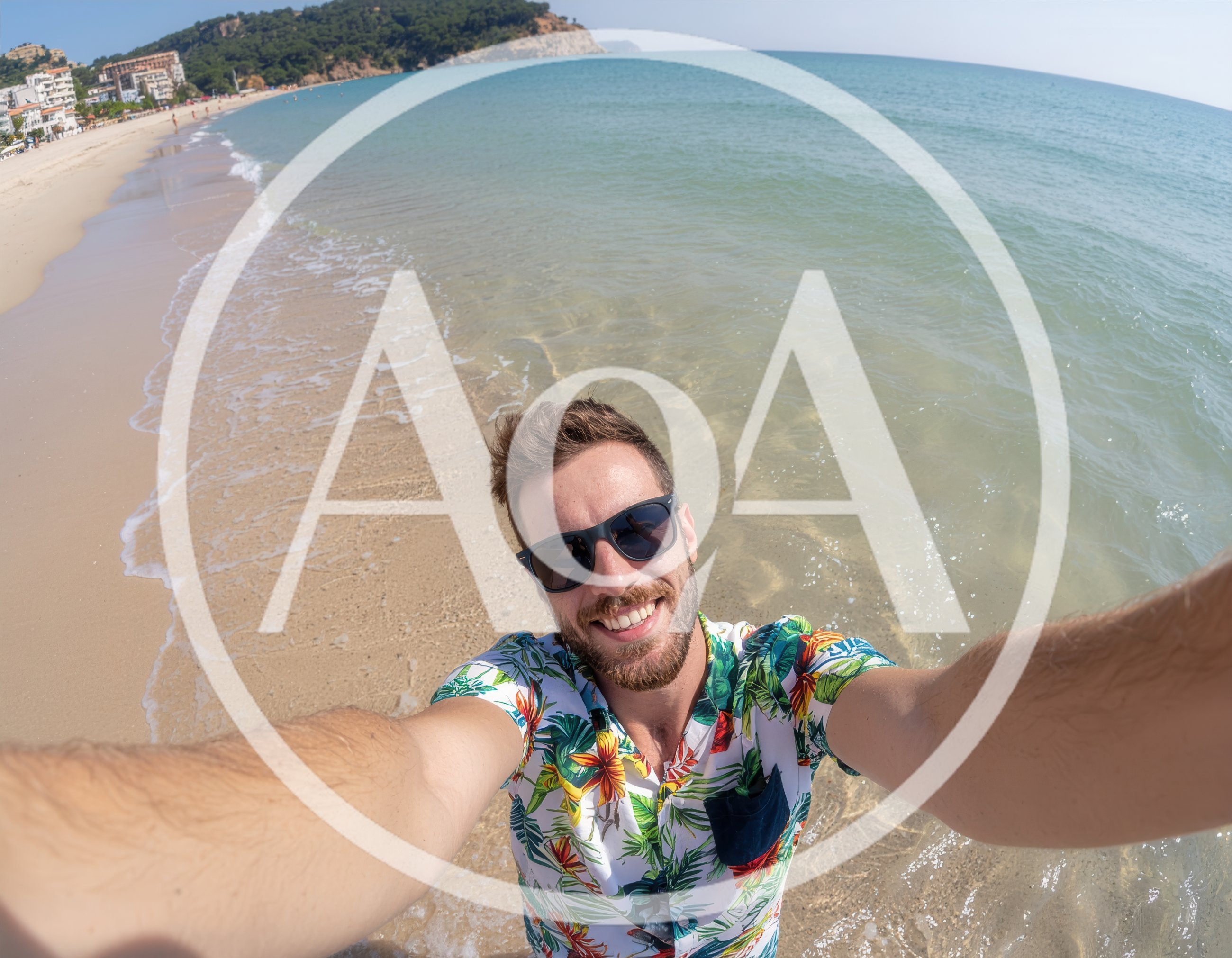 Young Man Taking Selfie On Tropical Beach