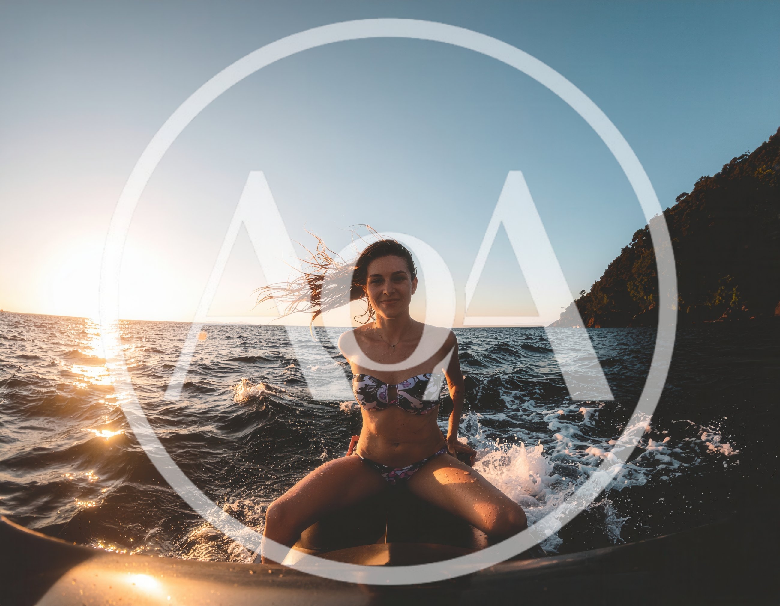Woman Riding Jet Ski During Golden Hour