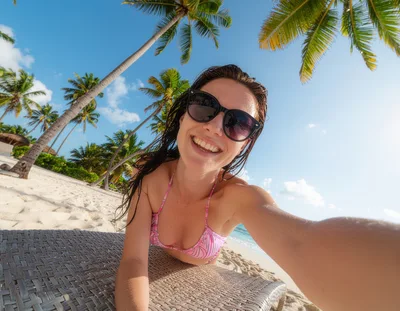 Young Woman Taking Selfie on Tropical Beach