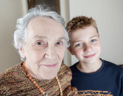 Portrait Of An Elderly Woman And Her Grandson