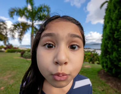 Close Up Portrait Of A Young Girl Making A Face