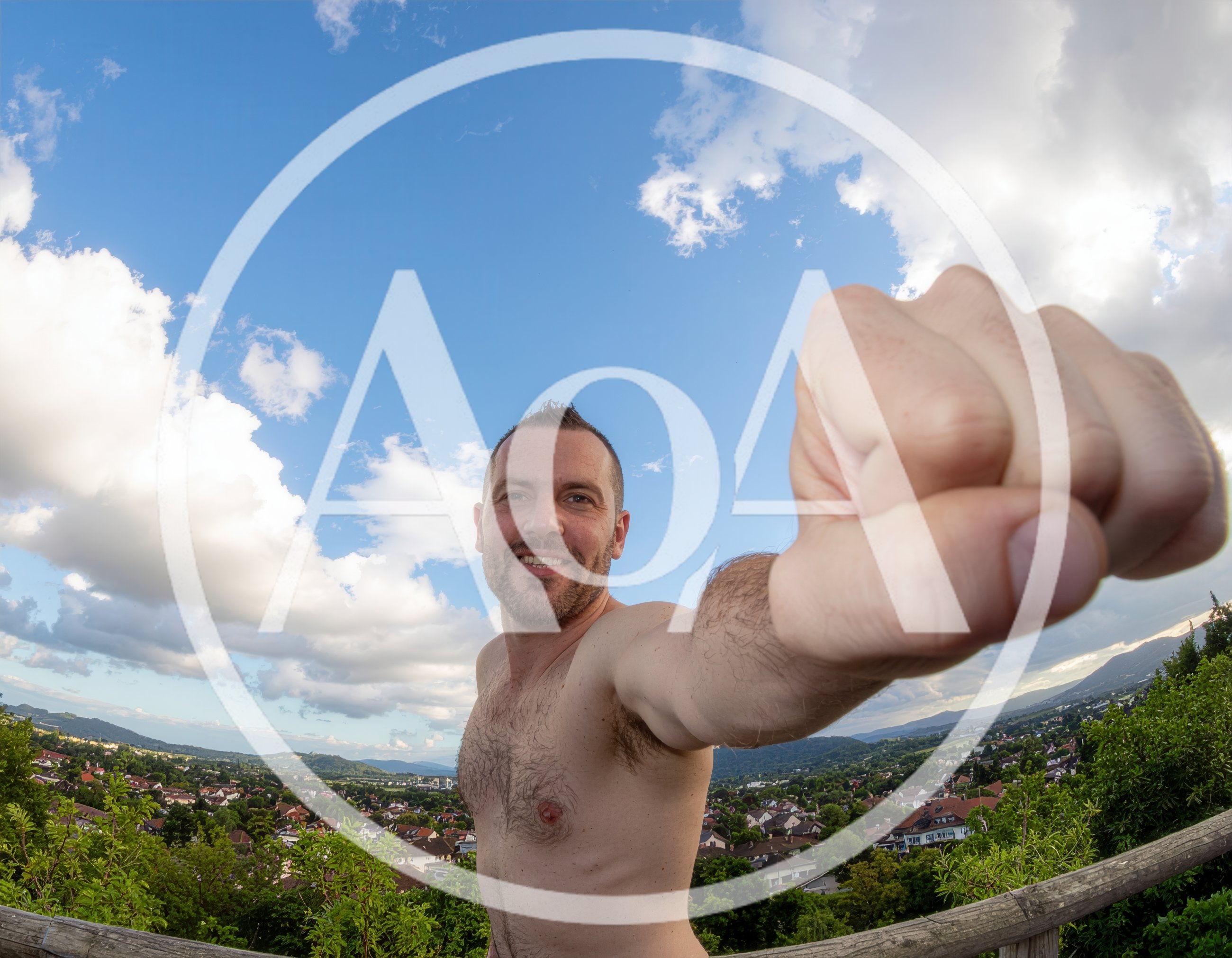 Shirtless Man Posing With Fist Forward Outdoors