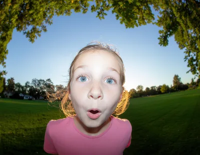 Young Girl With Surprised Expression Outdoors