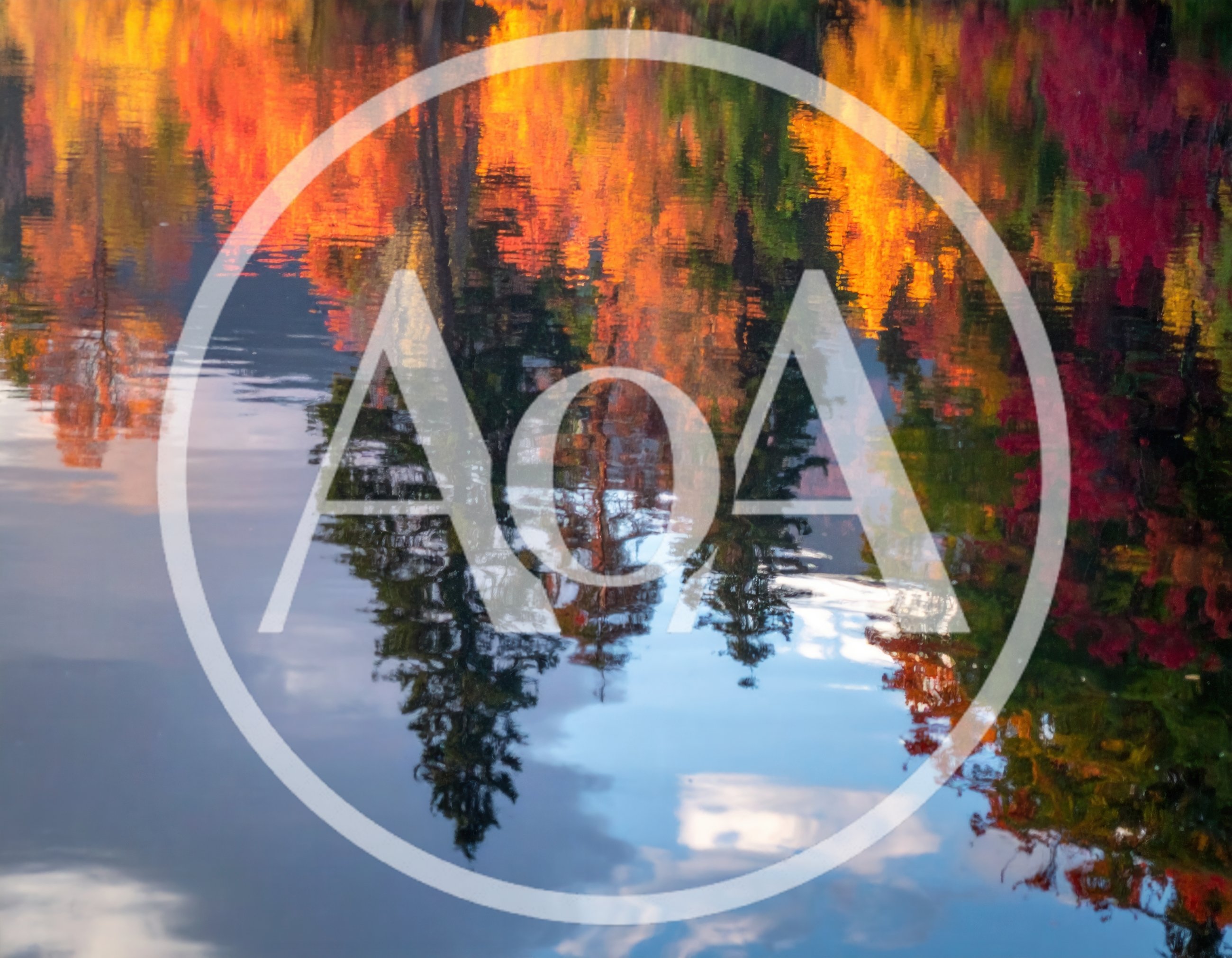 Vibrant Autumn Forest Reflection In Calm Lake Water