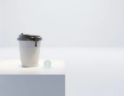 Coffee Cup With Melting Globe On White Pedestal
